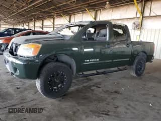 ✅ 2012 Nissan Titan Pro-4X • VIN: 1N6BA0EC6CN301479 • Лот: 43704045. Опубликован ранее на Copart с пробегом 183 603 миль. Бесплатный доступ к архиву аукционных продаж из США и подробный отчёт об истории автомобиля на DreamBid. Изображение 1.