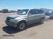 ✅ 2002 Suzuki XL7 Standard • VIN: JS3TX92V624106133 • Lot: 42716640. Listed on IAAI with 162,139 mi. Free auction sales archive from the USA and detailed vehicle history report at DreamBid. Image 2.