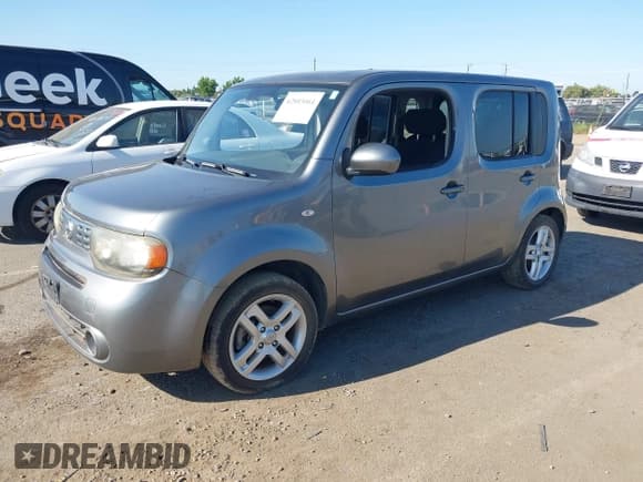 ✅ 2009 Nissan Cube S • VIN: JN8AZ28R49T122143 • Лот: 42803064. Опубликован ранее на IAAI с пробегом 130 999 миль. Бесплатный доступ к архиву аукционных продаж из США и подробный отчёт об истории автомобиля на DreamBid. Изображение 2.