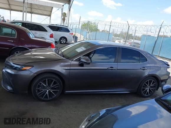 2021 Toyota Camry Hybrid SE с VIN 4T1G31AKXMU028863, выставлен на аукционе IAAI как лот 41946598 с пробегом 53 805 миль миль и . История ставок и продаж доступна на DreamBid. Изображение 14.