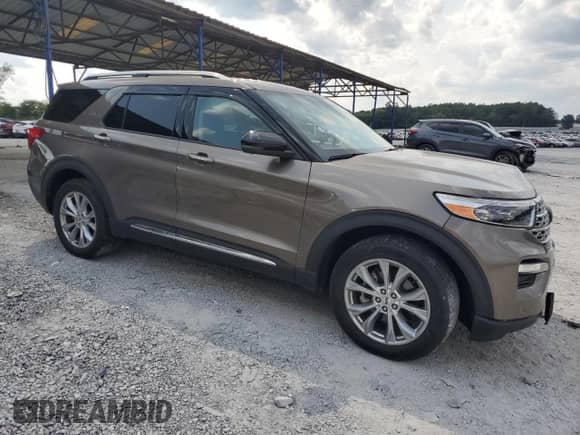 2021 Ford Explorer Limited with VIN 1FMSK8FH6MGA14413, listed as a Copart auction lot 71562005 with 56,947 mi miles and Salvage title. Bid and sale history available at DreamBid. Image 4.