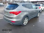 ✅ 2016 Hyundai Santa Fe • VIN: 5XYZW4LA3GG315347 • Lot: 43732067. Listed on IAAI with 79,895 mi. Free auction sales archive from the USA and detailed vehicle history report at DreamBid. Image 4.