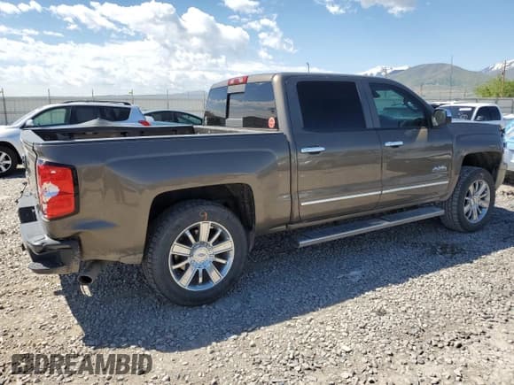 ✅ 2014 Chevrolet Silverado 1500 High Country • VIN: 3GCUKTEC2EG538881 • Лот: 54925814. Опубликован ранее на Copart с пробегом 141 723 миль. Бесплатный доступ к архиву аукционных продаж из США и подробный отчёт об истории автомобиля на DreamBid. Изображение 3.