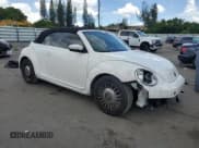 ✅ 2014 Volkswagen Beetle 2.5L • VIN: 3VW5P7AT1EM802710 • Lot: 67260185. Listed on Copart with 162,815 mi. Free auction sales archive from the USA and detailed vehicle history report at DreamBid. Image 4.