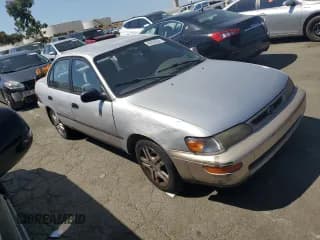 ✅ 1996 Toyota Corolla DX • VIN: 1NXBB02E8TZ354479 • Lot: 69330594. Listed on Copart with 201,957 mi. Free auction sales archive from the USA and detailed vehicle history report at DreamBid. Image 4.