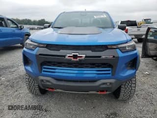 ✅ 2023 Chevrolet Colorado 4WD ZR2 • VIN: 1GCPTFEK1P1235806 • Лот: 72759114. Опубликован ранее на Copart с пробегом 11 090 миль. Бесплатный доступ к архиву аукционных продаж из США и подробный отчёт об истории автомобиля на DreamBid. Изображение 5.