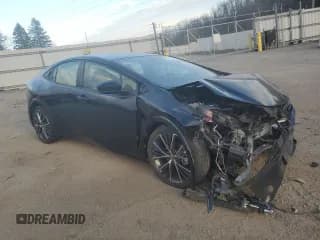 ✅ 2023 Toyota Prius LE • VIN: JTDACAAU9P3005290 • Lot: 76371313. Listed on Copart with 12,584 mi. Free auction sales archive from the USA and detailed vehicle history report at DreamBid. Image 4.