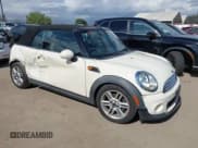 ✅ 2012 MINI Convertible • VIN: WMWZN3C53CT134194 • Lot: 42261686. Listed on IAAI with 104,099 mi. Free auction sales archive from the USA and detailed vehicle history report at DreamBid. Image 1.