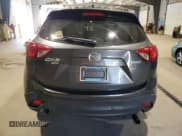 ✅ 2014 Mazda CX-5 Touring • VIN: JM3KE4CY7E0334818 • Lot: 82492195. Wystawiony na Copart z przebiegiem Nie podano. Bezpłatny archiwum sprzedaży aukcyjnych z USA i szczegółowy raport historii pojazdu na DreamBid. Zdjęcie 6.