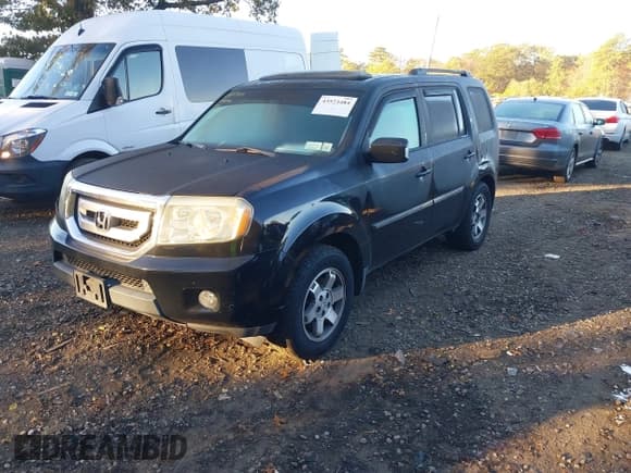 ✅ 2009 Honda Pilot Touring • VIN: 5FNYF48949B014963 • Lot: 43523484. Wystawiony na IAAI z przebiegiem 220 980 mil. Bezpłatny archiwum sprzedaży aukcyjnych z USA i szczegółowy raport historii pojazdu na DreamBid. Zdjęcie 2.