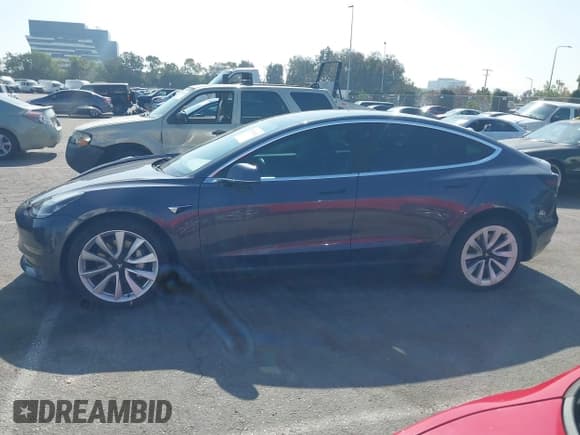 ✅ 2019 Tesla Model 3 Long Range • VIN: 5YJ3E1EB6KF209911 • Lot: 43537211. Listed on IAAI with 147,855 mi. Free auction sales archive from the USA and detailed vehicle history report at DreamBid. Image 14.