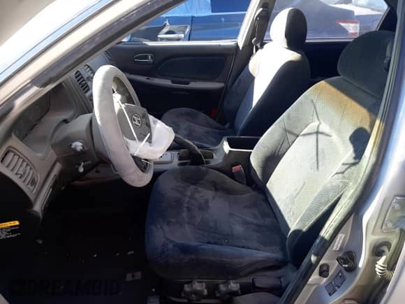 2003 Hyundai Sonata z VIN KMHWF25H93A810837, wystawiony jako Copart lot #87338264 z przebiegiem 73 916 mil mil oraz Nie do naprawy • Non repairable. Historia ofert i sprzedaży dostępna na DreamBid. Obrazek 7.