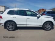✅ 2016 Volkswagen Touareg Lux • VIN: WVGEF9BP3GD004853 • Lot: 41905994. Listed on IAAI with 132,606 mi. Free auction sales archive from the USA and detailed vehicle history report at DreamBid. Image 13.