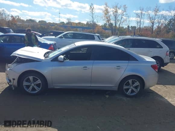 2013 Chevrolet Cruze 2LT with VIN 1G1PE5SB2D7245528, listed as a IAAI auction lot 43503941 with 173,810 mi miles and . Bid and sale history available at DreamBid. Image 14.