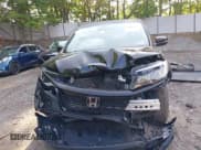 ✅ 2021 Honda Passport EX-L • VIN: 5FNYF8H57MB022083 • Lot: 42399294. Listed on IAAI with 61,014 mi. Free auction sales archive from the USA and detailed vehicle history report at DreamBid. Image 13.