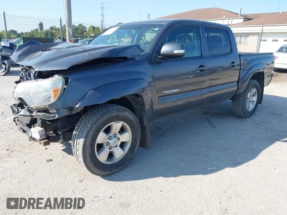 ✅ 2013 Toyota Tacoma • VIN: 3TMLU4EN2DM129101 • Lot: 43251172. Listed on IAAI with 171,384 mi. Free auction sales archive from the USA and detailed vehicle history report at DreamBid. Image 2.