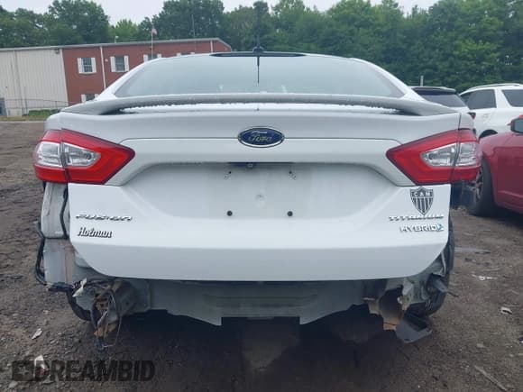 ✅ 2013 Ford Fusion Titanium Hybrid • VIN: 3FA6P0RU6DR315585 • Lot: 42598359. Listed on IAAI with 153,669 mi. Free auction sales archive from the USA and detailed vehicle history report at DreamBid. Image 8.