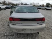 ✅ 1998 Ford Escort SE • VIN: 1FAFP13P6WW182609 • Lot: 77876884. Listed on Copart with 165,162 mi. Free auction sales archive from the USA and detailed vehicle history report at DreamBid. Image 6.