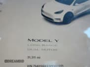 ✅ 2023 Tesla Model Y Long Range • VIN: 7SAYGDEE3PF613271 • Лот: 86440845. Опубликован ранее на Copart с пробегом 31 311 миль. Бесплатный доступ к архиву аукционных продаж из США и подробный отчёт об истории автомобиля на DreamBid. Изображение 9.