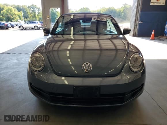 ✅ 2013 Volkswagen Beetle 2.5L • VIN: 3VW5P7AT2DM821636 • Lot: 80718975. Listed on Copart with 96,626 mi. Free auction sales archive from the USA and detailed vehicle history report at DreamBid. Image 5.