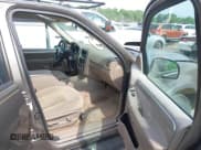 ✅ 2003 Ford Explorer XLT • VIN: 1FMZU73KX3UA95998 • Lot: 42080634. Listed on IAAI with 187,493 mi. Free auction sales archive from the USA and detailed vehicle history report at DreamBid. Image 5.