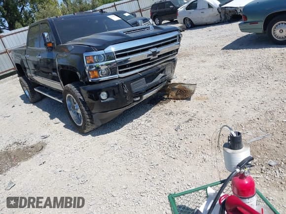 ✅ 2018 Chevrolet Silverado 2500HD High Country • VIN: 1GC1KXEY2JF276409 • Lot: 43179213. Listed on IAAI with 122,005 mi. Free auction sales archive from the USA and detailed vehicle history report at DreamBid. Image 1.