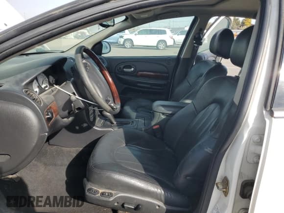 ✅ 2004 Chrysler 300M M • VIN: 2C3AE66G74H631556 • Lot: 90649775. Wystawiony na Copart z przebiegiem 145 742 mil. Bezpłatny archiwum sprzedaży aukcyjnych z USA i szczegółowy raport historii pojazdu na DreamBid. Zdjęcie 7.