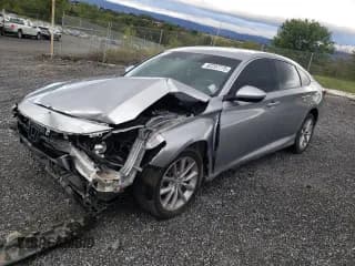 ✅ 2022 Honda Accord LX • VIN: 1HGCV1F15NA064977 • Lot: 82297775. Listed on Copart with 36,978 mi. Free auction sales archive from the USA and detailed vehicle history report at DreamBid. Image 1.