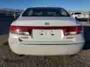 2007 Hyundai Azera SE z VIN KMHFC46F77A238884, wystawiony jako Copart lot #88598615 z przebiegiem 153 755 mil mil oraz Szkoda całkowita • Salvage title. Historia ofert i sprzedaży dostępna na DreamBid. Obrazek 6.