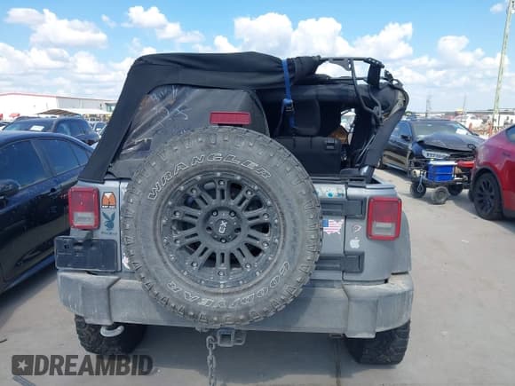 ✅ 2016 Jeep Wrangler Unlimited Sport • VIN: 1C4BJWDG5GL266669 • Lot: 43180650. Listed on IAAI with Not provided. Free auction sales archive from the USA and detailed vehicle history report at DreamBid. Image 15.