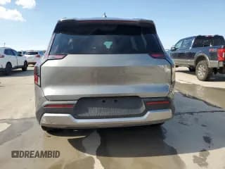 ✅ 2024 Kia EV9 Wind • VIN: KNDAFFS52R6030609 • Lot: 72476804. Wystawiony na Copart z przebiegiem 8 218 mil. Bezpłatny archiwum sprzedaży aukcyjnych z USA i szczegółowy raport historii pojazdu na DreamBid. Zdjęcie 6.