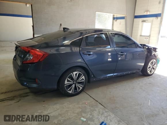✅ 2018 Honda Civic EX-T • VIN: 19XFC1E30JE000535 • Lot: 86624265. Listed on Copart with 130,182 mi. Free auction sales archive from the USA and detailed vehicle history report at DreamBid. Image 3.