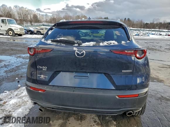 ✅ 2021 Mazda CX-30 Premium • VIN: 3MVDMBDL4MM209443 • Lot: 94878385. Listed on Copart with 63,326 mi. Free auction sales archive from the USA and detailed vehicle history report at DreamBid. Image 6.