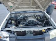 ✅ 2004 Nissan Frontier XE • VIN: 1N6ED29Y24C432220 • Lot: 91867775. Wystawiony na Copart z przebiegiem 183 822 mil. Bezpłatny archiwum sprzedaży aukcyjnych z USA i szczegółowy raport historii pojazdu na DreamBid. Zdjęcie 11.