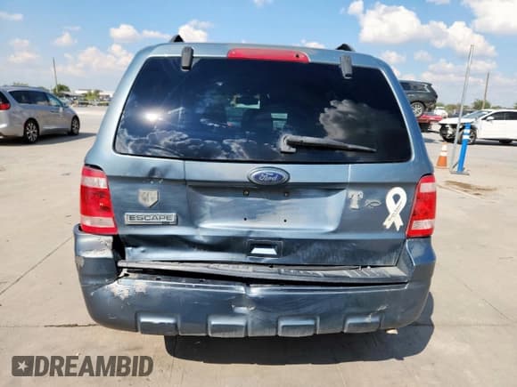 ✅ 2010 Ford Escape XLT • VIN: 1FMCU9D7XAKB95359 • Lot: 85080035. Wystawiony na Copart z przebiegiem 172 253 mil. Bezpłatny archiwum sprzedaży aukcyjnych z USA i szczegółowy raport historii pojazdu na DreamBid. Zdjęcie 6.