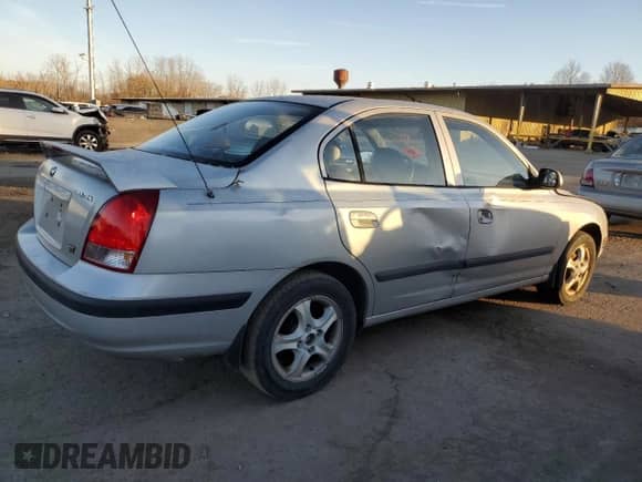 2003 Hyundai Elantra GLS z VIN KMHDN45D73U633397, wystawiony jako Copart lot #79562704 z przebiegiem 127 366 mil mil oraz Czysty tytuł • Clean title. Historia ofert i sprzedaży dostępna na DreamBid. Obrazek 3.