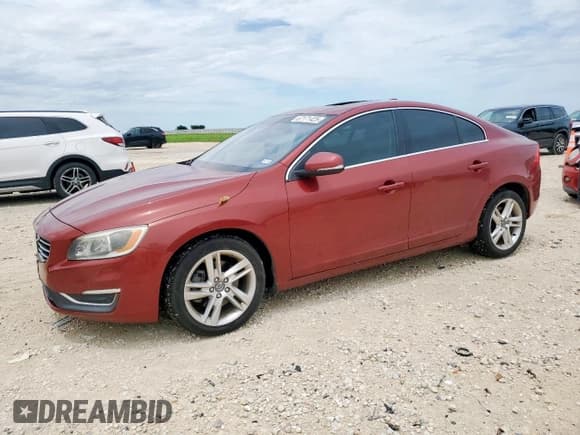 ✅ 2015 Volvo S60 T5 Drive-E Premier Plus • VIN: YV140MFC6F1313125 • Lot: 67171425. Listed on Copart with 84,027 mi. Free auction sales archive from the USA and detailed vehicle history report at DreamBid. Image 1.