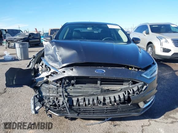 ✅ 2017 Ford Fusion Titanium • VIN: 3FA6P0SU0HR379525 • Lot: 43834410. Wystawiony na IAAI z przebiegiem 87 637 mil. Bezpłatny archiwum sprzedaży aukcyjnych z USA i szczegółowy raport historii pojazdu na DreamBid. Zdjęcie 12.