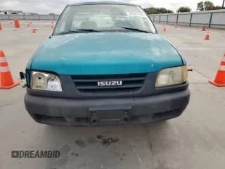 ✅ 1996 Isuzu Hombre S • VIN: 1GGCS1449T8711517 • Lot: 81641425. Wystawiony na Copart z przebiegiem 110 730 mil. Bezpłatny archiwum sprzedaży aukcyjnych z USA i szczegółowy raport historii pojazdu na DreamBid. Zdjęcie 5.