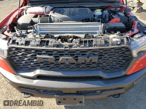 2025 Ram 1500 Rebel z VIN 1C6SRFLP4SN697440, wystawiony jako Copart lot #72078505 z przebiegiem 2 804 mil mil oraz Szkoda całkowita • Salvage title. Historia ofert i sprzedaży dostępna na DreamBid. Obrazek 11.