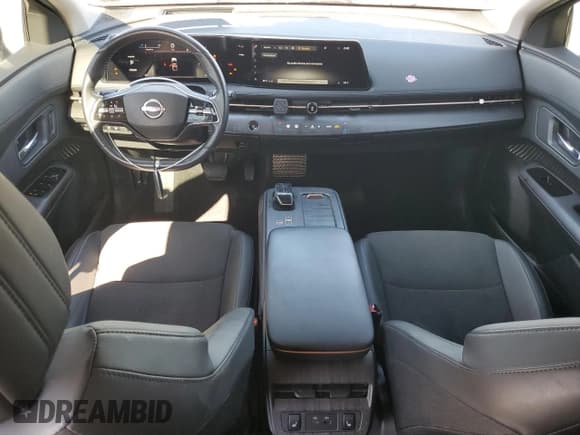 ✅ 2023 Nissan ARIYA Engage • VIN: JN1AF0BA6PM406105 • Lot: 87304785. Wystawiony na Copart z przebiegiem 47 407 mil. Bezpłatny archiwum sprzedaży aukcyjnych z USA i szczegółowy raport historii pojazdu na DreamBid. Zdjęcie 8.