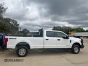 ✅ 2019 Ford F-350 XL • VIN: 1FT8W3BT1KEE59618 • Lot: 90719275. Listed on Copart with 103,999 mi. Free auction sales archive from the USA and detailed vehicle history report at DreamBid. Image 14.