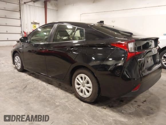 ✅ 2022 Toyota Prius L Eco • VIN: JTDKAMFU6N3189315 • Lot: 43616635. Listed on IAAI with 67,156 mi. Free auction sales archive from the USA and detailed vehicle history report at DreamBid. Image 3.