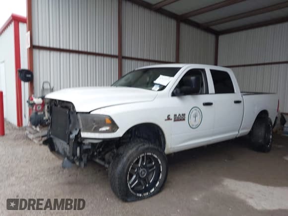 ✅ 2018 Ram 2500 Tradesman • VIN: 3C6UR5CL2JG283449 • Lot: 42113371. Listed on IAAI with 127,352 mi. Free auction sales archive from the USA and detailed vehicle history report at DreamBid. Image 18.