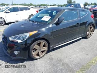 ✅ 2014 Hyundai Veloster Turbo • VIN: KMHTC6AE2EU184967 • Lot: 41780186. Wystawiony na IAAI z przebiegiem 104 822 mil. Bezpłatny archiwum sprzedaży aukcyjnych z USA i szczegółowy raport historii pojazdu na DreamBid. Zdjęcie 2.