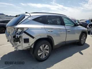 ✅ 2023 Hyundai Tucson Blue • VIN: KM8JBCA1XPU100368 • Lot: 66789874. Wystawiony na Copart z przebiegiem 21 105 mil. Bezpłatny archiwum sprzedaży aukcyjnych z USA i szczegółowy raport historii pojazdu na DreamBid. Zdjęcie 3.