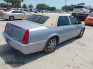 ✅ 2006 Cadillac DTS 1SC • VIN: 1G6KD57Y56U109483 • Lot: 42103757. Wystawiony na IAAI z przebiegiem 106 746 mil. Bezpłatny archiwum sprzedaży aukcyjnych z USA i szczegółowy raport historii pojazdu na DreamBid. Zdjęcie 4.