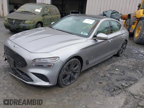✅ 2023 Genesis G70 2.0T • VIN: KMTG34TAXPU115811 • Lot: 42384218. Listed on IAAI with 35,262 mi. Free auction sales archive from the USA and detailed vehicle history report at DreamBid. Image 2.