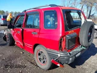 ✅ 2002 Chevrolet Tracker • VIN: 2CNBE13C326917199 • Lot: 43834641. Listed on IAAI with 113,973 mi. Free auction sales archive from the USA and detailed vehicle history report at DreamBid. Image 3.