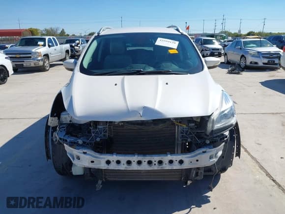 ✅ 2014 Ford Escape Titanium • VIN: 1FMCU0JXXEUB15116 • Lot: 43599128. Listed on IAAI with 181,184 mi. Free auction sales archive from the USA and detailed vehicle history report at DreamBid. Image 13.